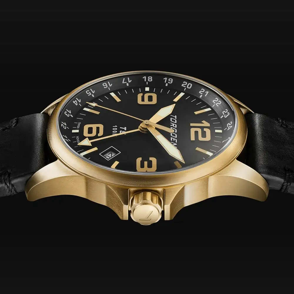 Classic gold watch with an elegant black strap on a sleek black background shines in packshot ecommerce After