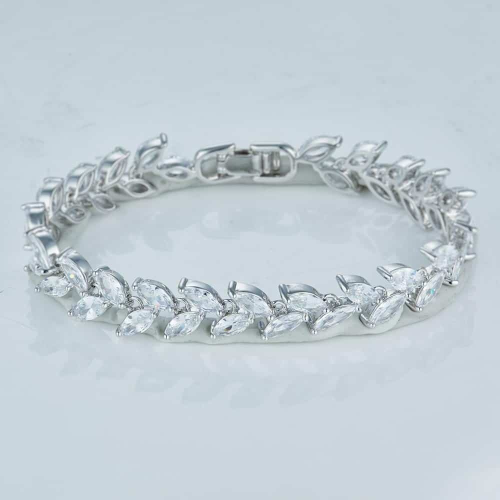 Floral themed Silver Bracelet with white gems in packshot ecommerce showcasing professional jewelry photography Before