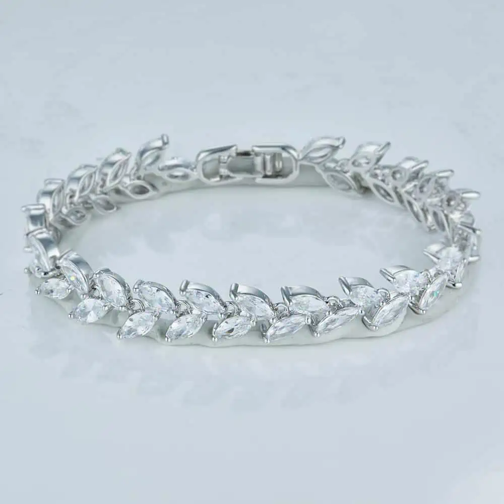 Floral themed Silver Bracelet with white gems in packshot ecommerce showcasing professional jewelry photography Before