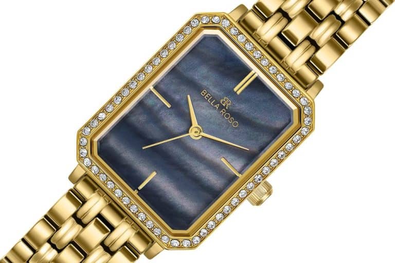 Luxurious gold watch featuring a grey mother of pearl dial decorated with sparkling white jewels shines in white background product photography