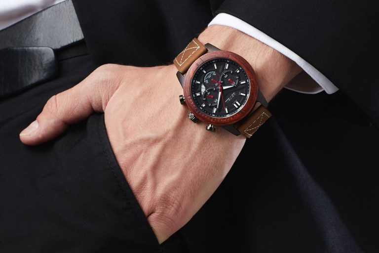 Wooden watches on male wrist pocket in watches photography lifestyle product photography